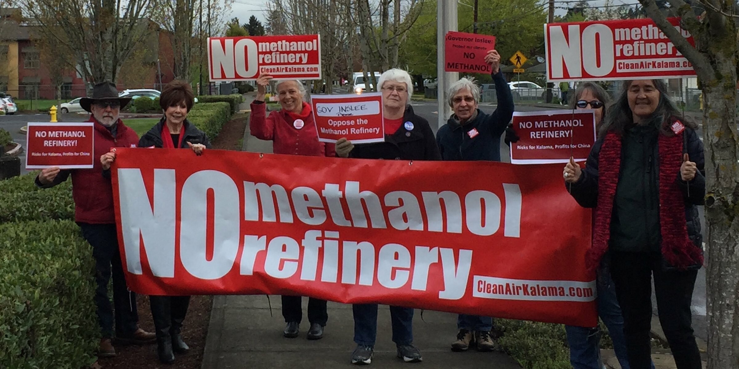 Local climate activists at silent sidewalk protest in Fruit Valley, April 2018, while Gov. Inslee campaigned at elementary school.